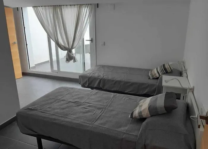 Duplex davant mar